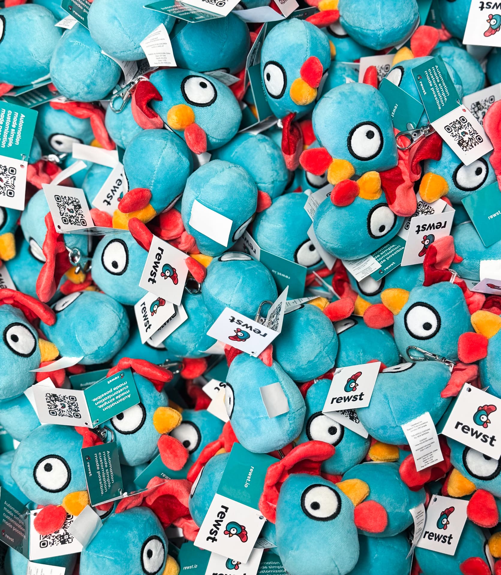 Branded plush keyrings piled together